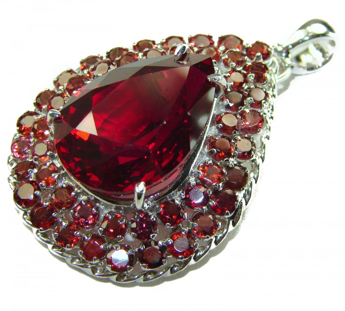 Rare finding! 27.2 carat authentic Kashmir Ruby rhodium over .925 Sterling Silver handmade Statement Pendant Brooch - Close-up of Kashmir Ruby pendant with rhodium and circular stones.