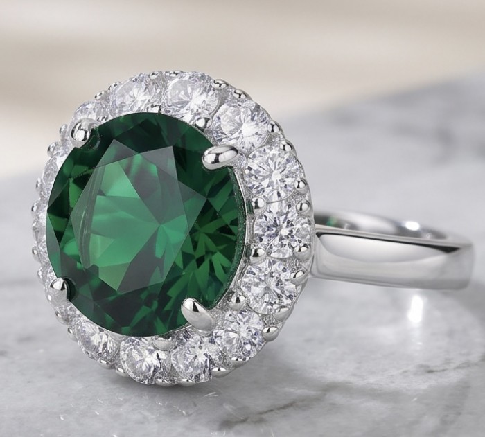 Elizabeth oval cut 9.8 carat Colombian Emerald 4.2 carat Moissanite .925 Sterling Silver dipped in Rhodium handcrafted Ring size 7 1/4 - Close-up of Elizabeth ring with oval Colombian emerald and diamonds.