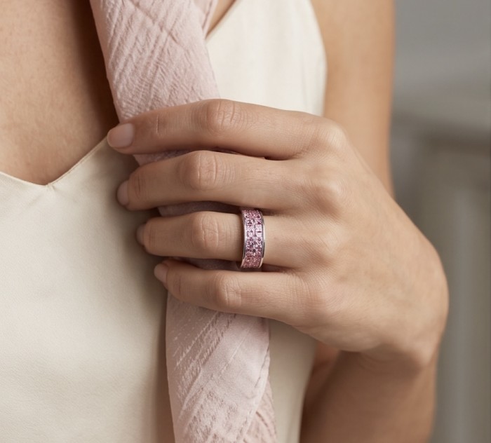 Eternity - authentic pear cut 8.5 carat Pink Sapphire .925 Sterling Silver Handcrafted Statement Ring size 6 - Pink sapphire eternity band worn on hand, close-up view.