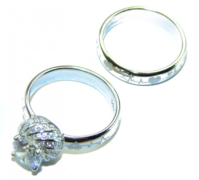 6.8 carat White Topaz .925 Sterling Silver brilliantly handcrafted stack ring s. 7 1/4 - Sterling silver rings with a heart and heartbeat design, top view.