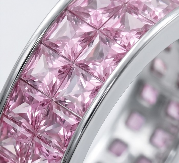 Eternity - authentic pear cut 8.5 carat Pink Sapphire .925 Sterling Silver Handcrafted Statement Ring size 6 - Close-up of pink sapphire eternity ring with pear cuts and silver band.