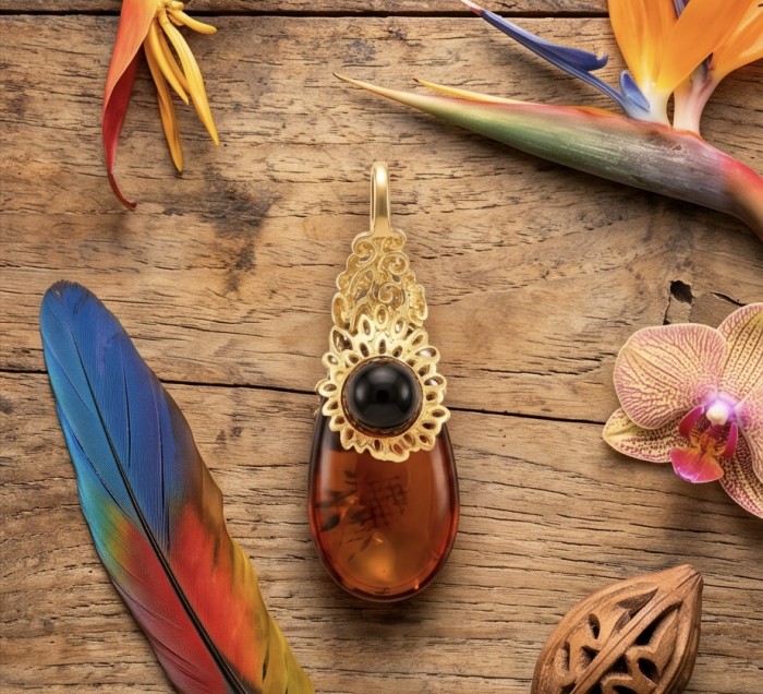Prehistoric Authentic Baltic Amber 18K Gold over .925 Sterling Silver beautifully handcrafted Pendant - Amber pendant with gold detail, surrounded by feathers and flowers.