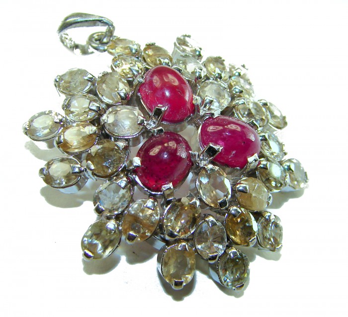 Deluxe 29.2 carat Ruby yellow Sapphire .925 Sterling Silver handmade Pendant - Pendant with rubies and sapphires, top view, in sterling silver setting.