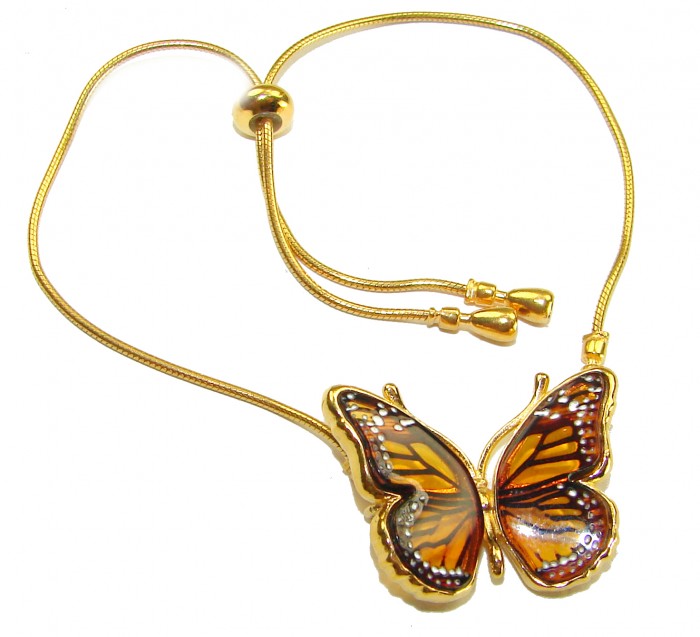 Golden Butterfly Genuine carved Baltic Amber 18K Gold over .925 Sterling Silver handamde Bracelet - Golden butterfly necklace with amber, top view, adjustable chain visible.