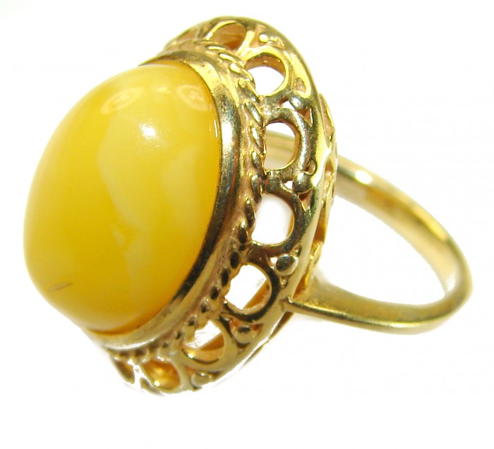Authentic Butterscotch Baltic Amber 18K Gold over .925 Sterling Silver handcrafted ring; s. 7 adjustable - Side view of a butterscotch Baltic amber ring in 18K gold over .925 silver.