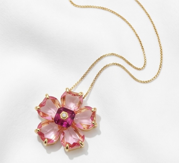 Cherry Blossom 28.5 carat Pink Topaz 14K Gold over .925 Silver handcrafted Statement necklace - Pink topaz flower necklace on white fabric, top view.