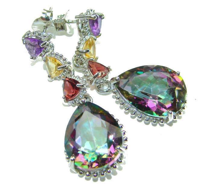 Incredible 14.2 carat Mystic Topaz .925 Sterling Silver handcrafted earrings - Close-up of Mystic Topaz earrings with colorful gemstones in silver setting.