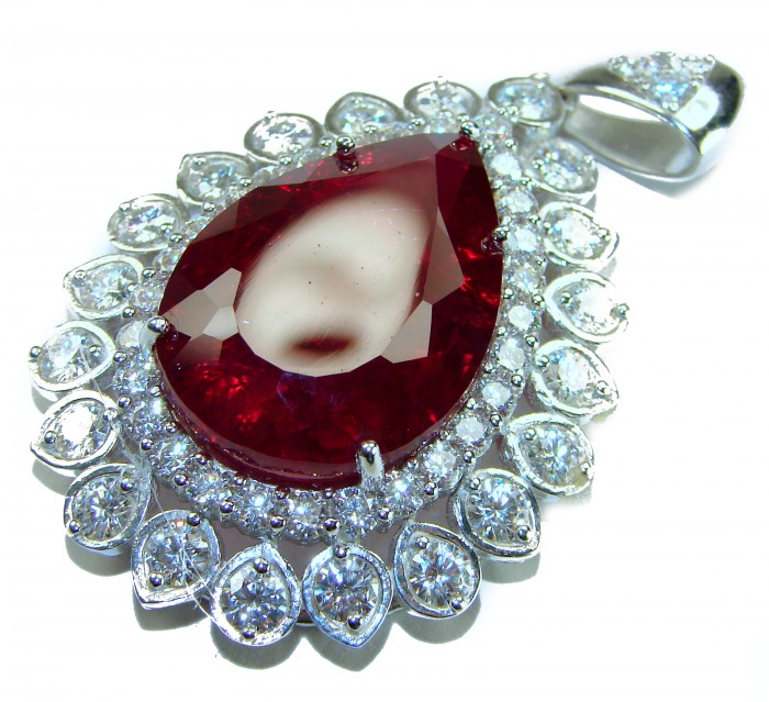 Rare finding! Deluxe 49.8 carat authentic Kashmir Ruby rhodium over .925 Sterling Silver handmade Statement Pendant - Close-up of a deluxe Kashmir ruby pendant with intricate diamond detailing.