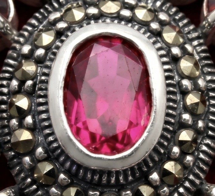 Giovanna 22.2 carat authentic Mozambique Ruby Marcasite .925 Sterling Silver handmade Pendant - Stone close-up of Giovanna Mozambique Ruby and Marcasite jewelry piece.