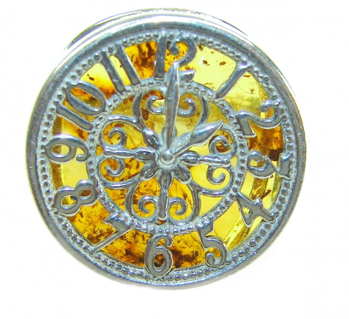 The Light Watchmaker Authentic Baltic Amber .925 Sterling Silver handcrafted ring; s. 6 adjustable - Close-up of The Light Watchmaker with amber and sterling silver details.