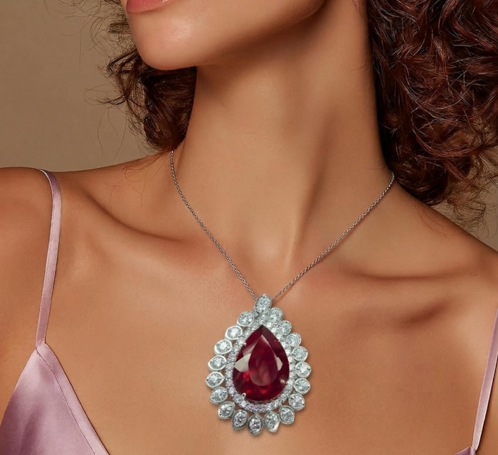 Rare finding! Deluxe 49.8 carat authentic Kashmir Ruby rhodium over .925 Sterling Silver handmade Statement Pendant - Kashmir Ruby necklace worn, front view showcasing the pendant.