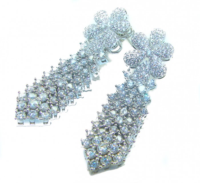 Dazzling Beauty - 22.5 carat White Topaz .925 Sterling Silver handcrafted earrings - Close-up of dazzling white topaz earrings with floral design.