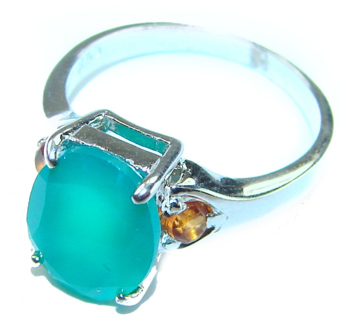 Authentic 2.3 carat Emerald .925 Sterling Silver handmade Cocktail Ring s. 4 3/4 - Close-up of emerald ring on silver band with secondary stones.