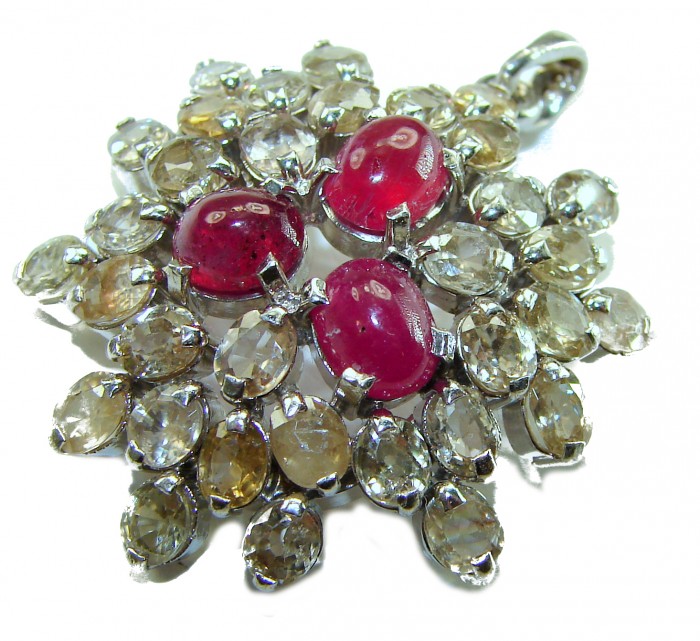 Deluxe 29.2 carat Ruby yellow Sapphire .925 Sterling Silver handmade Pendant - Close-up of ruby and sapphire pendant with sterling silver setting