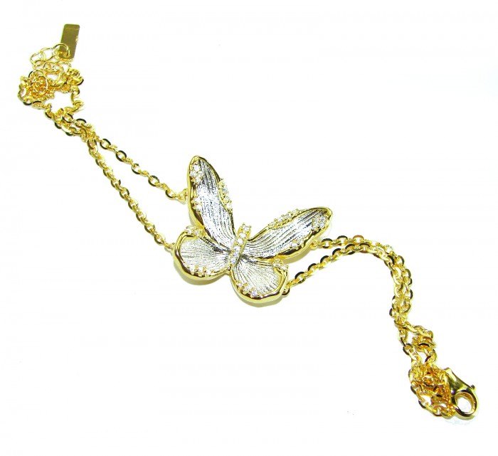 Golden Butterfly White Topaz highly polished 18K Gold over .925 Sterling Silver Italy made bracelet - Butterfly bracelet, gold with white topaz, angled view, chain and clasp visible.