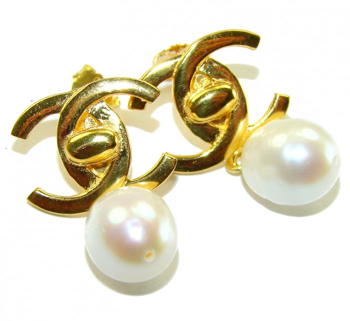 Classy Design - Genuine Pearl 14K Gold over .925 Sterling Silver handcrafted Statement Earrings - Close-up of pearl earrings with gold detail.