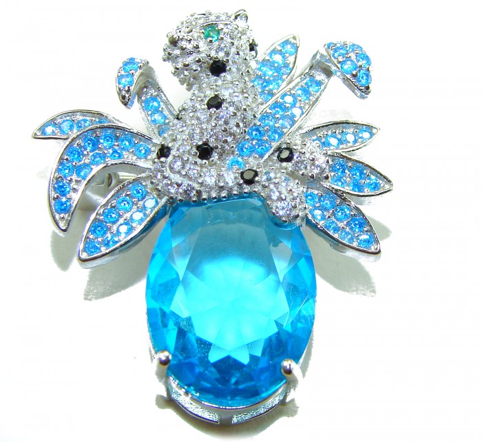 Blue Cheetah authentic 12.5 carat Swiss Blue Topaz .925 Sterling Silver Handcrafted pendant brooch - Blue Cheetah brooch, top view, featuring Swiss Blue Topaz and crystals.
