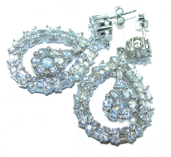 Allure Natural 16.2 carat White Topaz .925 Sterling Silver handcrafted earrings - Dangling earrings with white topaz detail close-up on white background.