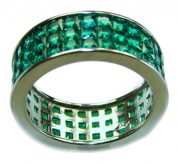 Authentic 10.2 carat Colombian Emerald .925 Sterling Silver handcrafted Ring size 6 - Side view of emerald-studded sterling silver ring.