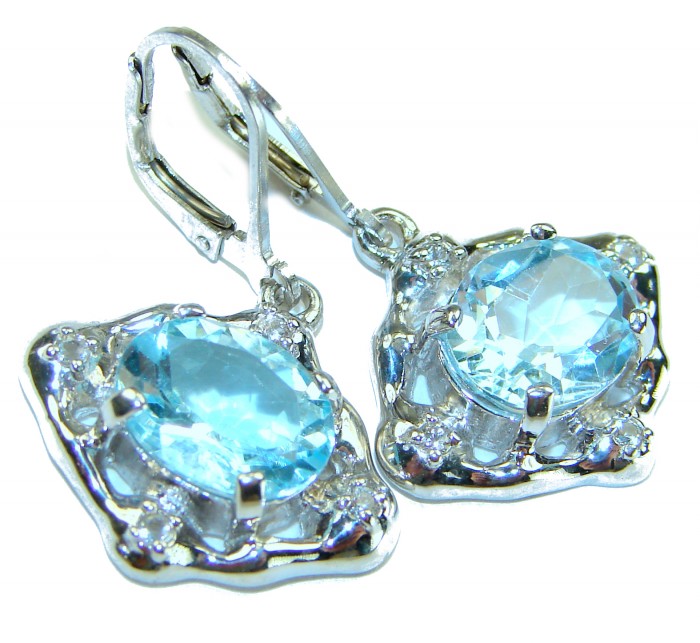 Memories 10.5 carat Swiss Blue Topaz .925 Sterling Silver Handcrafted Earrings - Close-up of blue topaz earrings in sterling silver setting