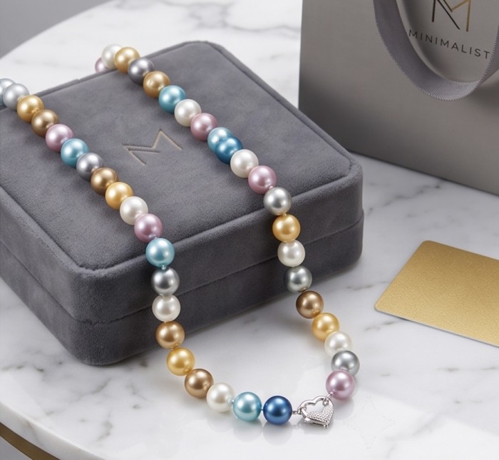 Colors of the Ocean - Outstanding Pearl .925 Sterling Silver handcrafted Statement necklace - Colorful pearl necklace with heart clasp on a box, top view