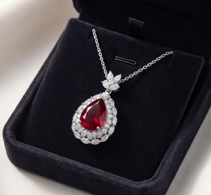Luxurious 10.8 carat natural Ruby White Topaz .925 Sterling Silver .925 Sterling Silver Statement Necklace - Luxurious ruby necklace in box, showcasing teardrop gem and white topaz settings.