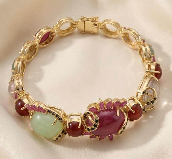Mademoiselle 41.2 carat Mozambique Ruby Golden Sapphire .925 Sterling Silver dipped in 18K Gold Statement bracelet - Golden bracelet with colorful stones, top view, detailed link design.
