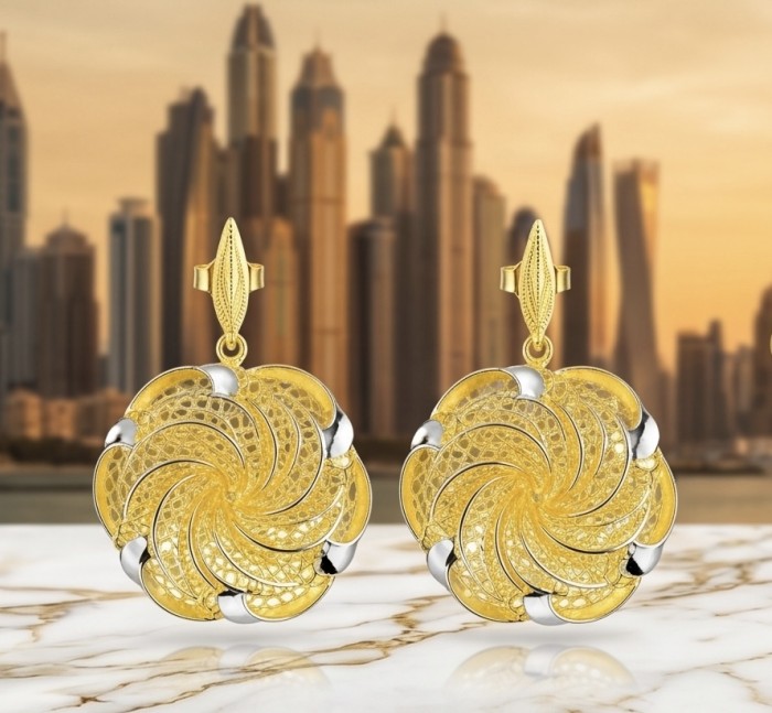 Dubai Style - .925 Sterling Silver dipped in 22K Gold handmade Earrings - Dubai skyline backdrop with gold earrings, front view on marble surface.