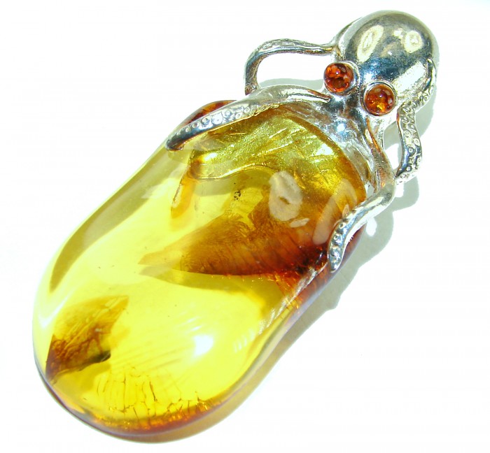 Enchanted Ocean - Large Octopus genuine Baltic Amber .925 Sterling Silver handmade Pendant - Large octopus genuine Baltic amber pendant, top view.