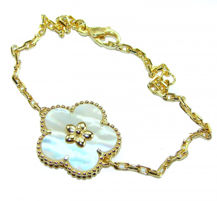 Fantastic Blister Pearl 14K Gold over .925 Silver handmade Bracelet - Gold bracelet with flower charm, top view showing details.