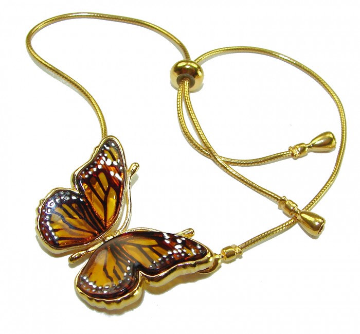 Golden Butterfly Genuine carved Baltic Amber 18K Gold over .925 Sterling Silver handamde Bracelet - Golden butterfly bracelet with amber, front view, adjustable clasp visible.