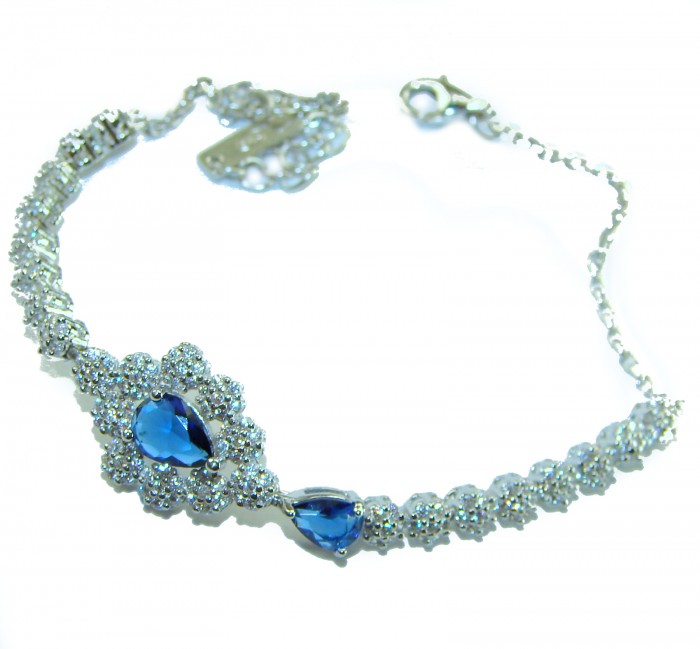 Born to Glam 4.2 carat natural Sapphire .925 Sterling Silver Perfectly handcrafted Statement Bracelet - Elegant bracelet with blue sapphire stones, front view.
