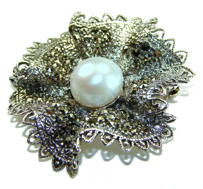 Genuine white Pearl Marcasite .925 Sterling Silver handcrafted Brooch - Close-up of genuine white pearl and marcasite sterling silver brooch.