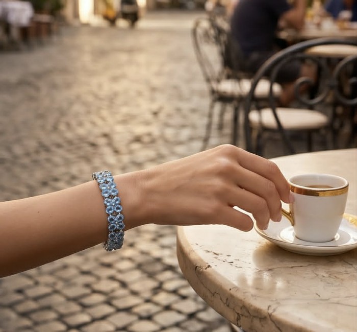 Tiffany - Magnificent 105.5 carat Swiss Blue Topaz .925 Sterling Silver handcrafted Heavy Bracelet - Worn on hand, 105.5 carat blue topaz bracelet with coffee.
