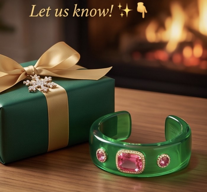 Candy Store - Modern Design Natural Green Raisin Pink Topaz .925 Sterling Silver bracelet - Green bracelet with pink stones beside wrapped gift by a fireplace.