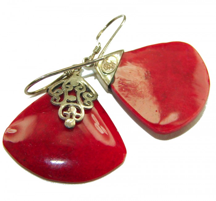 Elizabeth Natural Fossilized Coral .925 Sterling Silver handcrafted earrings - Red coral earrings close-up with intricate silver detailing.