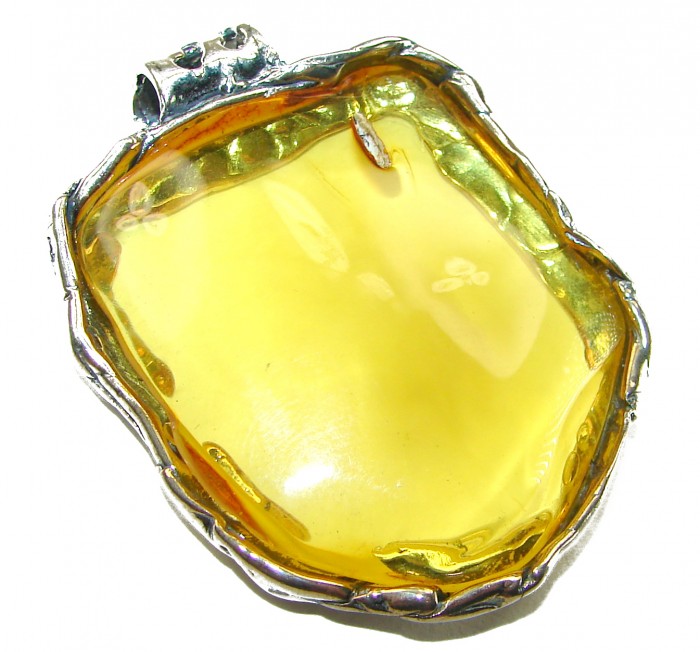 Prehistoric Authentic Baltic Amber .925 Sterling Silver beautifully handcrafted Large Pendant - Close-up of Baltic Amber pendant with .925 Sterling Silver setting.