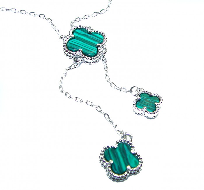 Outstanding authentic inlay Malachite Lucky Four Leaf Clover .925 Sterling Silver necklace - Malachite clover necklace close-up on white background.