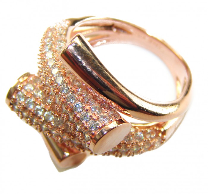 SPECTACULAR 5.9 carat White Topaz Sterling Silver Italy made Silver dipped in 18K ROSE Gold Ring size 7 1/4 - Top view of a rose gold ring with white topaz stones.