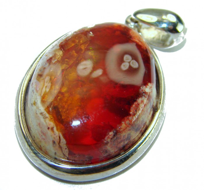 Inner Fire Natural 20.2 carat Mexican Fire Opal .925 Sterling Silver dipped in rhodium handmade Pendant - Close-up of Mexican Fire Opal pendant with sterling silver setting.