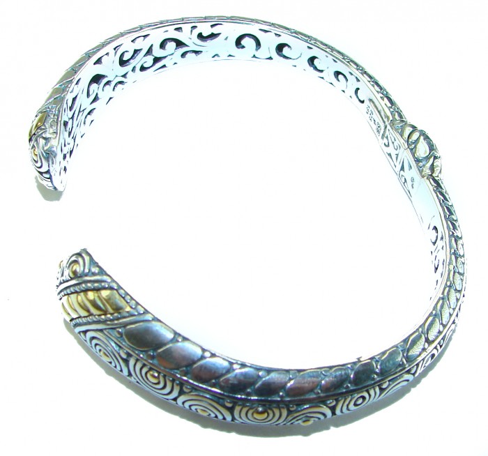 Bali Legacy 28.9 grams authentic 2 tones .925 Sterling Silver handcrafted bracelet - Side view of ornate Bali Legacy two-tone sterling silver bracelet.