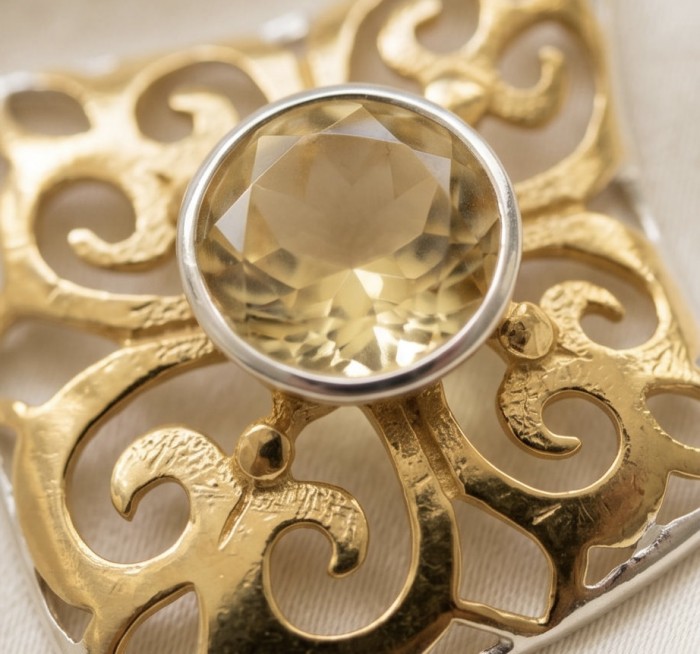 Giovanna - Authentic 5.9 carat Brazilian Citrine .925 Sterling Silver dipped in 18k Gold handcrafted earrings - Close-up of Brazilian citrine set in ornate gold sterling silver design.