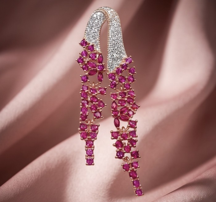 Byzantine Style 6.5 carat Ruby 18K Rose Gold over .925 Sterling Silver handcrafted pendant - Ruby and diamond earrings, close-up, on pink fabric background.