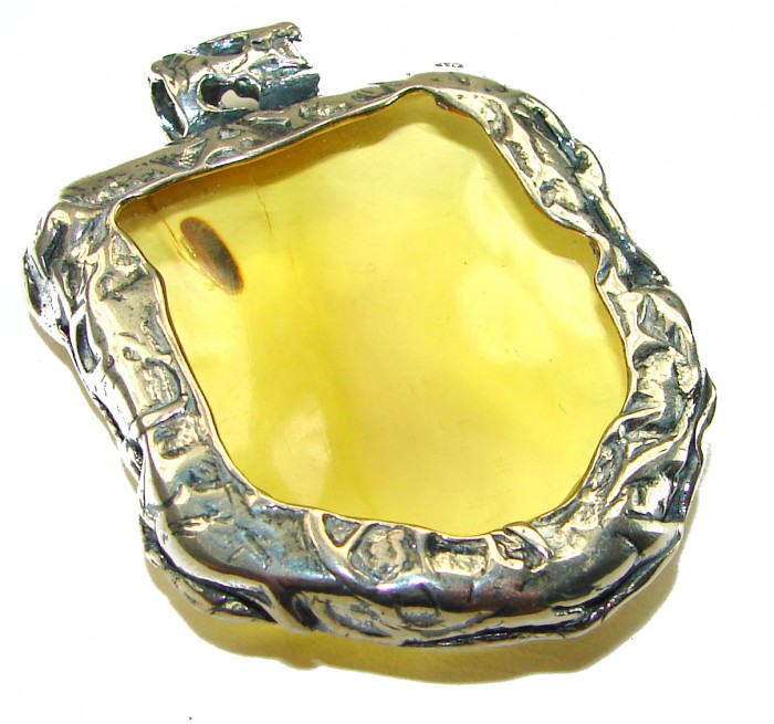 Prehistoric Authentic Baltic Amber .925 Sterling Silver beautifully handcrafted Large Pendant - Stone close-up of Baltic amber in .925 sterling silver setting