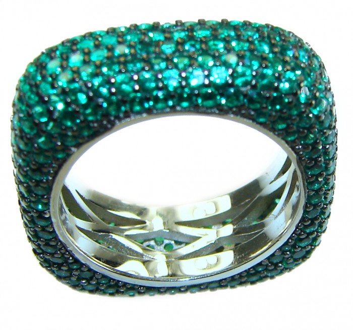 Love Forever - authentic 18.2 carat Emerald .925 Sterling Silver Eternity Ring size 6 - Close-up of emerald-encrusted sterling silver ring, top view.
