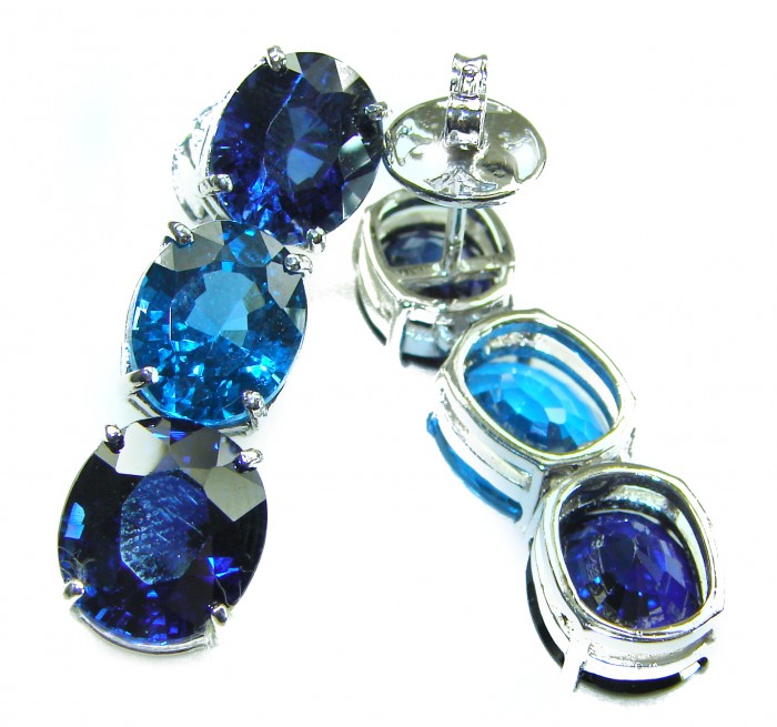 Deep Ocean 22.5 carat London Blue Topaz .925 Sterling Silver handmade Statement earrings - Close-up of Deep Ocean London Blue Topaz earrings in sterling silver.