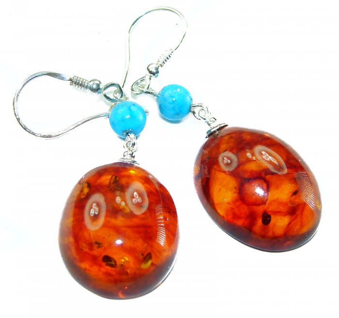 Baltic Polish Amber Turquoise .925 Sterling Silver Earrings - Amber turquoise earrings close-up with sterling silver hooks.