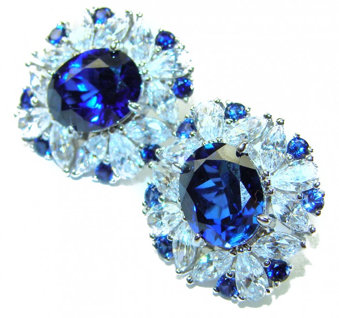Gabriella 6.2 carat authentic Sapphire .925 Sterling Silver handcrafted Statement earrings - Close-up of sapphire and sterling silver earrings with detailed stones.
