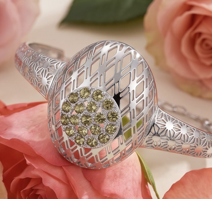 Casablanca - authentic 2.2 carat Morganite Peridot .925 Sterling Silver Bracelet - Close-up of Casablanca bracelet with Morganite Peridot on floral background