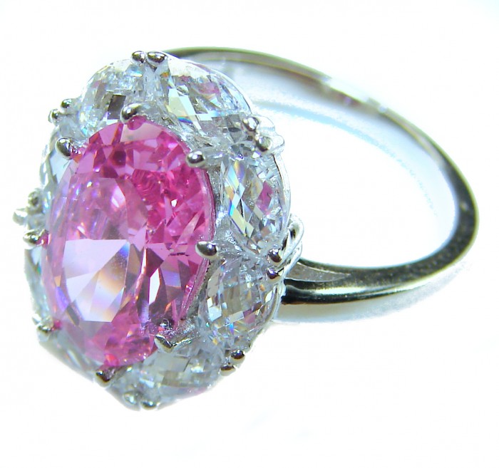 Art Deco - Born to Glam authentic 10.5 CARAT Pink Topaz .925 Silver handcrafted Eternity Ring s. 6 - Pink topaz ring close-up, surrounded by clear gemstones, angled view.